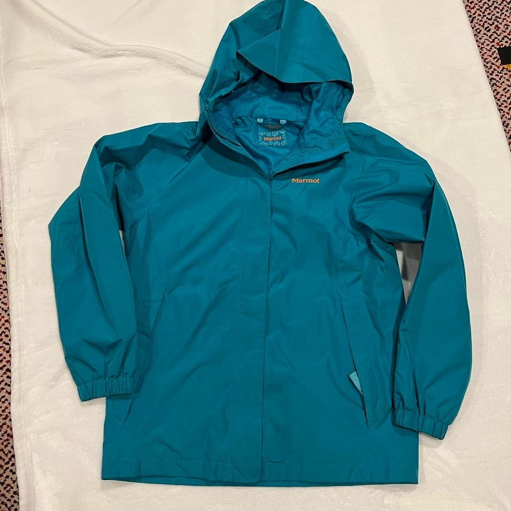 Youth size Marmot rain jacks. Size youth XL. PRETTY TEAL BLUE COLOR W/ orange